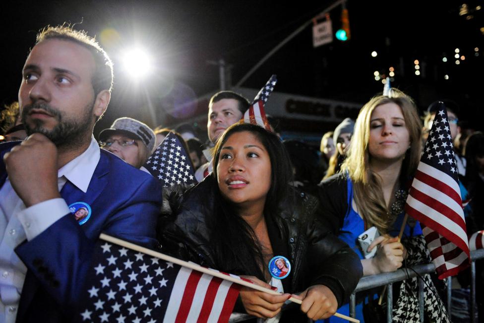 Supporters of Democratic U.S. presidential nominee Hillary Clinton watch results come in from the overflow crowd outside the nominee's election night rally in New York