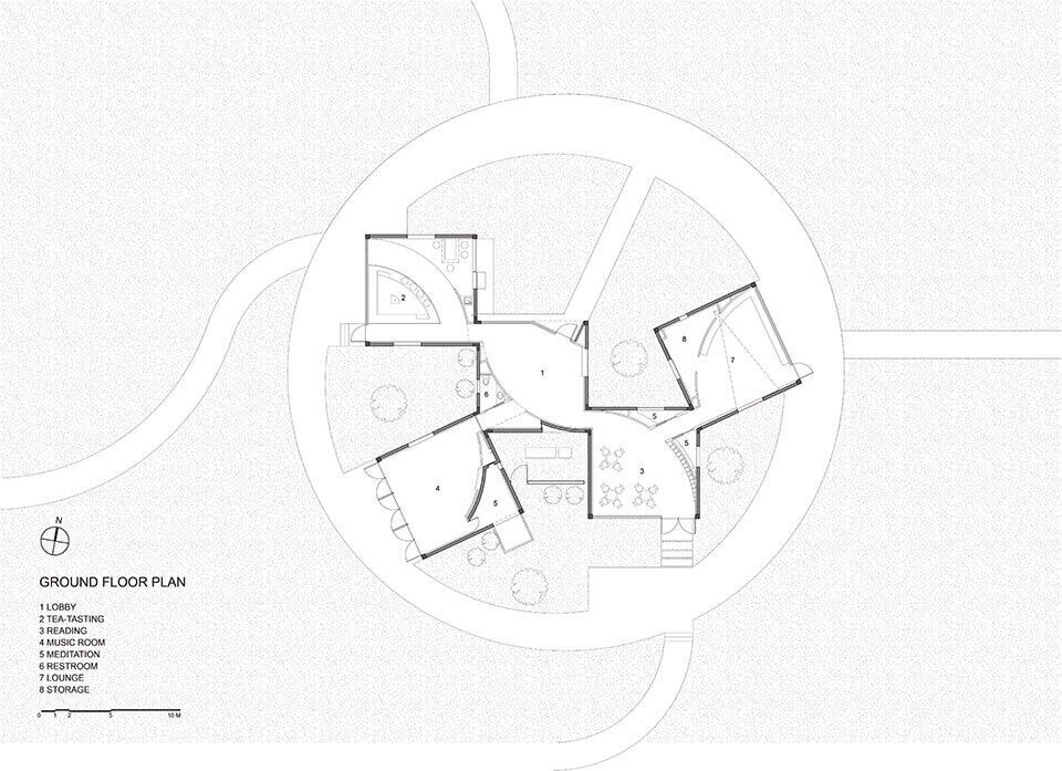 کتابخانه روستایی آتلیه Xi مجموعه ای از بلوک های زاویه دار در یک زمین پوشیده از گل است